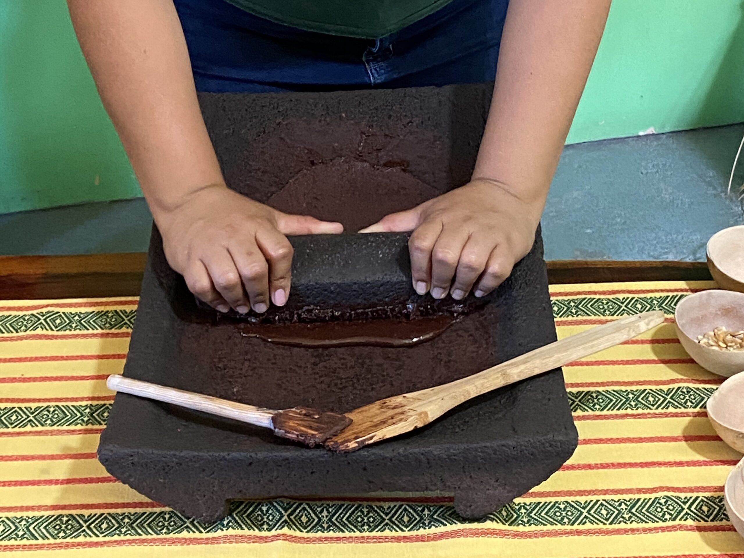 Grinding the cacao down